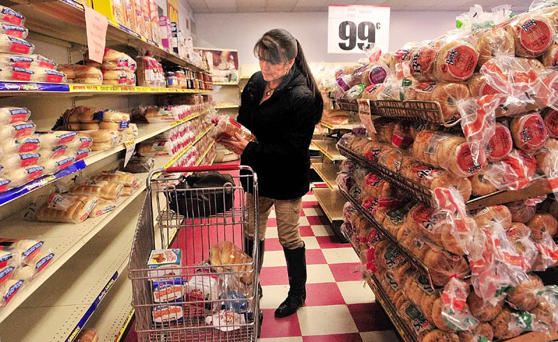 Doreen Campbell, of West Gardiner, shops for bread on Friday afternoon at the J.J. Nissen Hostess Bakery Outlet on Leighton Road in Augusta.