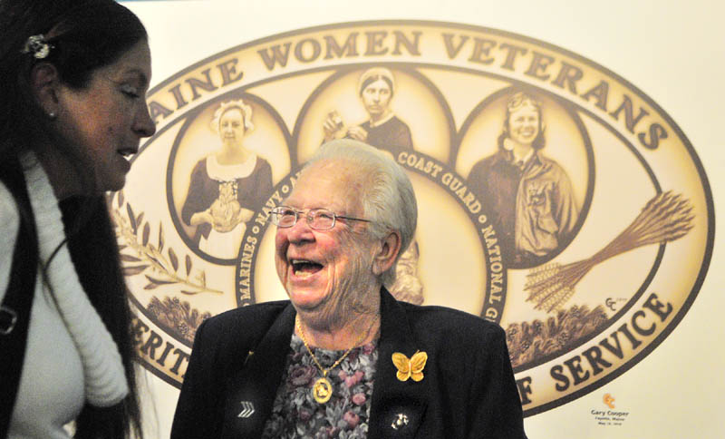 Shirley Chen, of Fairfield Center, who served as an Army private first class from 1979 to 1981, left, and Ruth Marshall Gilmore, of South China, who served as a sergeant in the Marine Corps from 1954-56, chat after the ceremony to present a commemorative silver coin to Maine women veterans on Friday afternoon in the Chapel at at the VA Healthcare Systems Maine Medical Center - Togus. Before the ceremony began, there had been a presentation to a World War II veteran who was a patient in the hospital there. The coin is a replica of the plaque displayed in the Hall of Flags depicting Maine women who served in different U.S. military capacities over four centuries. According to a press release, the featured women are: 18th century, Hannah Watts Weston, Revolutionary War patriot; 19th century, Emily W. Dana, Civil War Union Army nurse; 20th century, Patricia A. (Chadwick) Erickson, WWII Women Air Force Service Pilots; and 21st century, Sgt. Annette M. Bachman, war on terrorism, Maine Army National Guard.