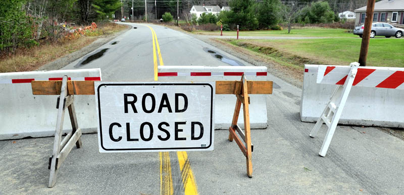 The Whittier Road in Farmington is now closed to traffic, due to a nearby unstable and eroding Sandy River embankment.
