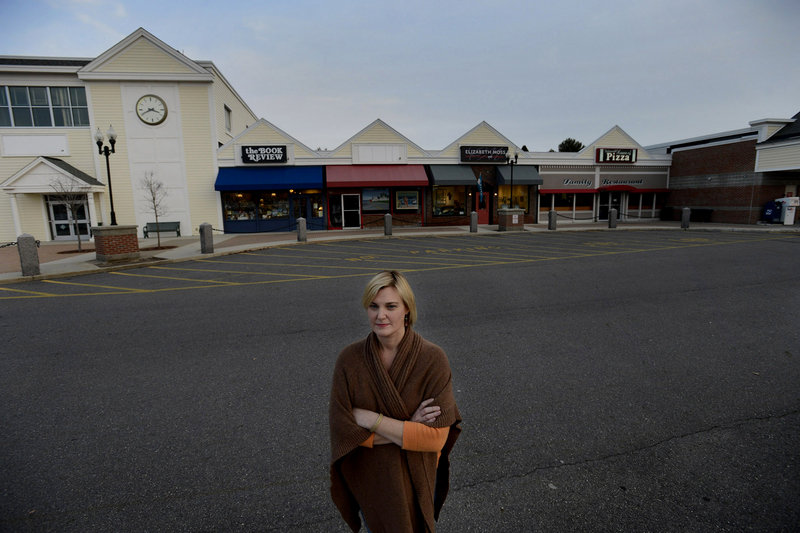 Elizabeth Moss, owner of Elizabeth Moss Fine Art Gallery and Framing in Falmouth, believes new limits on store sizes restrict options for potential future businesses.