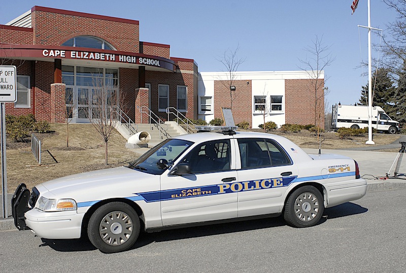 In this March 2008 file photo, a police cruiser sits in front of Cape Elizabeth High School. Police are investigating a Friday, Dec. 10, 2012 marijuana-cookie incident that has led to the suspension of nine Cape Elizabeth High School students.