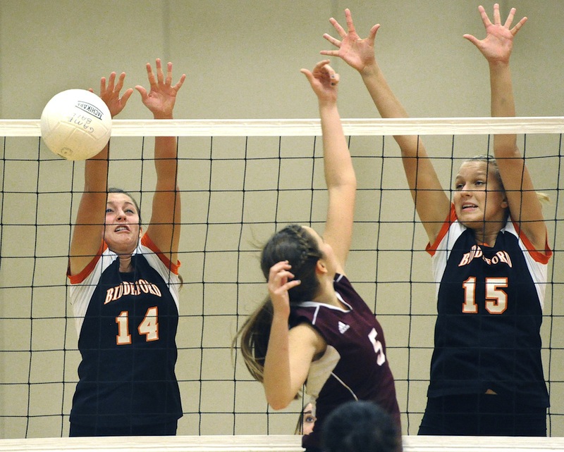 Int his file photo, Biddeford's No. 14 Mariah Hebert blocks a shot from Gorham's No. 5 Quincy Shaw in the state semifinals Wednesday, Oct. 24, 2012. Hebert was named Maine's Gatorade Volleyball Player of the Year on Wednesday, Dec. 12, 2012.