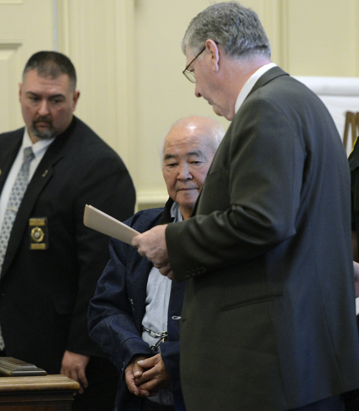 James Pak, center, appears in York County Superior Court in Alfred on Monday to face charges of fatally shooting Derrick Thompson, 19, and Alivia Welch, 18, on Monday in Biddeford. With Pak is his attorney, Joel Vincent, right.