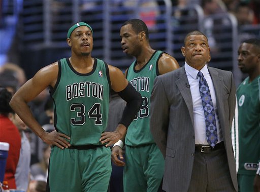 Boston Celtics' Doc Rivers, right, looks toward the screen next to Paul Pierce in the first half of an NBA basketball game against the Los Angeles Clippers in Los Angeles, Thursday, Dec. 27, 2012. (AP Photo/Jae C. Hong)
