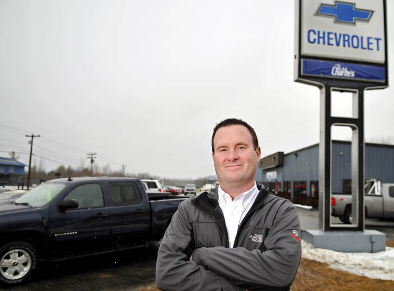 Staff photo by Andy Molloy ON A ROLL: Steve Shuman's, whose family operates Charlie's Motor Mall, is the new president of Charlie's Chevrolet, formerly Bob Barrow's Chevrolet, in Winthrop. The Shuman family bought the business Tuesday.