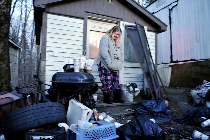 Becky Ratcliff stays in an outbuilding she describes as a "bedroom" on the China property of her mother, Judith Farris, in China. The town may raze the property, forcing the couple to relocate.
