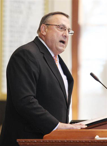 Gov. Paul LePage speaks Wednesday at the swearing in ceremony for new representatives at the State House. LePage administered the oath of office to the new legislators who were elected last month.