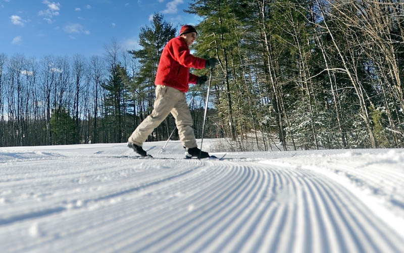 Steve Knight, of Oakland, skis down a groomed cross country ski trail at Quarry Road Recreation Area in Waterville on Friday. Knight was pleased with the fresh snow and noted he's excited at the prospect of snowmaking machines being installed to help keep the trails useable through warmer and dryer weather.