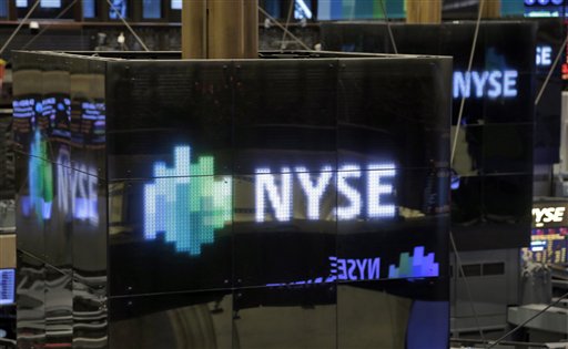 NYSE logos top trading posts on the floor of the New York Stock Exchange on Thursday.