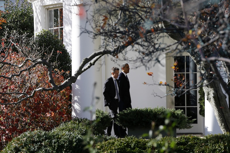 President Barack Obama walks with Treasury Secretary Timothy Geithner to the Oval Office at the White House in Washington, Wednesday, Dec. 5, 2012, as he returned from speaking about the fiscal cliff at Business Roundtable, an association of chief executive officers. (AP Photo/Charles Dharapak)