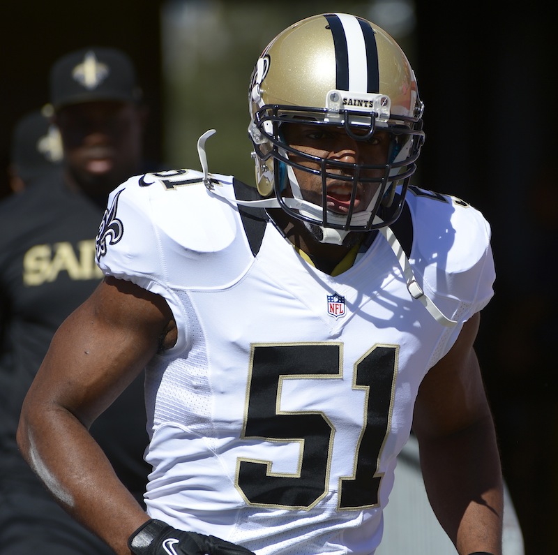 This Oct. 21, 2012 file photo shows New Orleans Saints football linebacker Jonathan Vilma (51) running onto the field in Tampa, Fla., Sunday, Oct. 21, 2012. In a sharp rebuke to his successor's handling of the NFL's bounty investigation, former Commissioner Paul Tagliabue overturned the suspensions of four current and former New Orleans Saints players in a case that has preoccupied the league for almost a year. Vilma was one of those suspended. (AP Photo/Phelan M. Ebenhack, File)