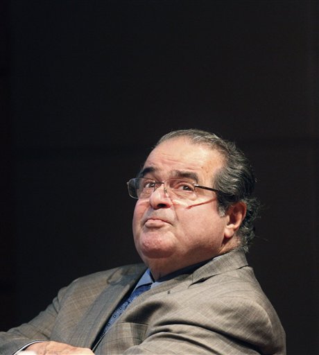 U.S. Supreme Court Justice Antonin Scalia found himself on Monday defending his legal writings that some find offensive and anti-gay. Scalia has been giving speeches around the country to promote his new book, "Reading Law," and his lecture at Princeton comes just days after the court agreed to take on two cases that challenge the federal Defense of Marriage Act, which defines marriage as between a man and a woman.