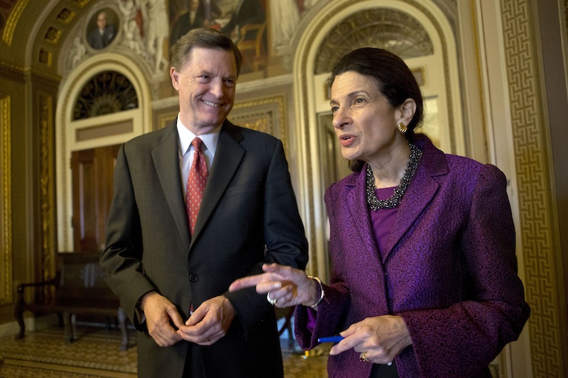 Retiring Sen. Olympia Snowe, R-Maine, accompanied by her husband, former Maine Gov. John "Jock" McKernan Jr., talks on Capitol Hill in Washington on Thursday after giving her farewell speech in the Senate chamber. Snowe said she remains hopeful that the Senate can overcome "excessive political polarization" to work together to reach consensus on important issues facing the nation.