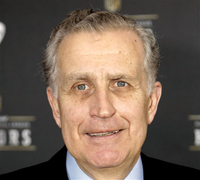This Feb. 4, 2012 file photo shows former NFL Commissioner Paul Tagliabue in Indianapolis. In a sharp rebuke to his successor's handling of the NFL's bounty investigation, former Commissioner Paul Tagliabue overturned the suspensions of four current and former New Orleans Saints players in a case that has preoccupied the league for almost a year. (AP Photo/David Stluka, File)