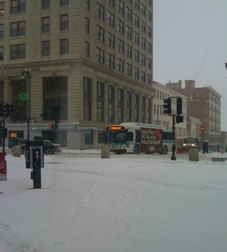 Traffic was light on Congress Street in Portland Thursday as heavy snow and sleet fell in the city.