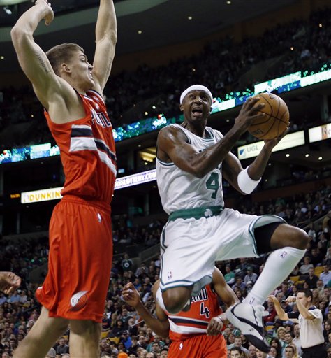 Boston Celtics' Jason Terry (4) looks to shot against Portland Trail Blazers' Meyers Leonard during the first quarter of an NBA basketball game in Boston, Friday, Nov. 30, 2012. (AP Photo/Michael Dwyer)