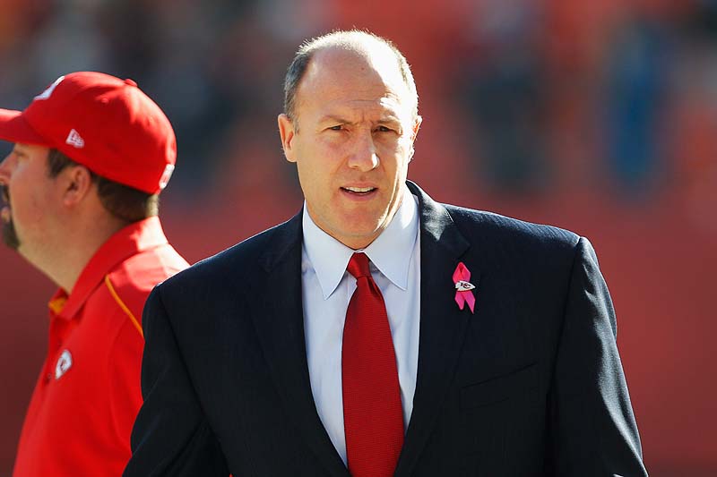 Kansas City Chiefs General Manager Scott Pioli walks on the field before Sunday's game against the Carolina Panthers at Arrowhead Stadium in Kansas City, Mo., a day after Chiefs linebacker and former UMaine player Jovan Belcher killed himself after fatally shooting his girlfriend.