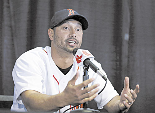 SIGNED, SEALED, DELIVERED: New Boston Red Sox outfielder Shane Victorino speaks during an introductory news conference Thursday at Fenway Park in Boston. The Red Sox signed Victorino to a $39M, three-year deal.