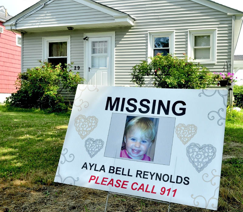 SIGN: This sign has been recently placed at 29 Violette Ave. in Waterville where Ayla Reynolds was first reported missing seven months ago today.