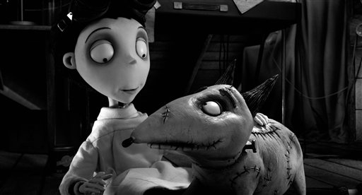 This film image released by Disney shows Victor Frankenstein, voiced by Charlie Tahan, with Sparky, in a scene from "Frankenweenie." The film was nominated for a Golden Globe for best animated film on Thursday, Dec. 13, 2012. The 70th annual Golden Globe Awards will be held on Jan. 13. (AP Photo/Disney) frankenweenie;tim burton;disney;victor;sparky;stop motion;animation