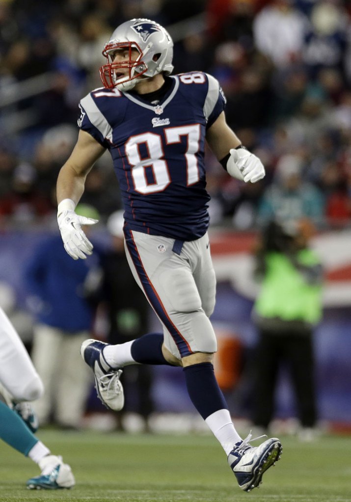 GRONK’S BACK: New England Patriots tight end Rob Gronkowski played for the first time since breaking his forearm on Nov. 18. He had two catches for 44 yards and a touchdown.