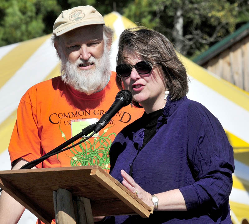 Maine Organic Farmers and Gardeners Association Executive Director Russell Libby introduces Kathleen Merrigan at the Common Ground Country Fair on Sept. 23. Libby, executive director of the organization for 17 years, died on Sunday.