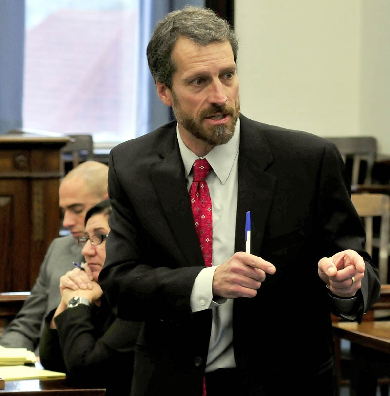Defense attorney Phil Mohlar makes a point during his closing arguments during the Robert Nelson murder trial in Somerset County Superior Court in Skowhegan on Tuesday. At the immediate left is state prosecutor Leane Zainea.