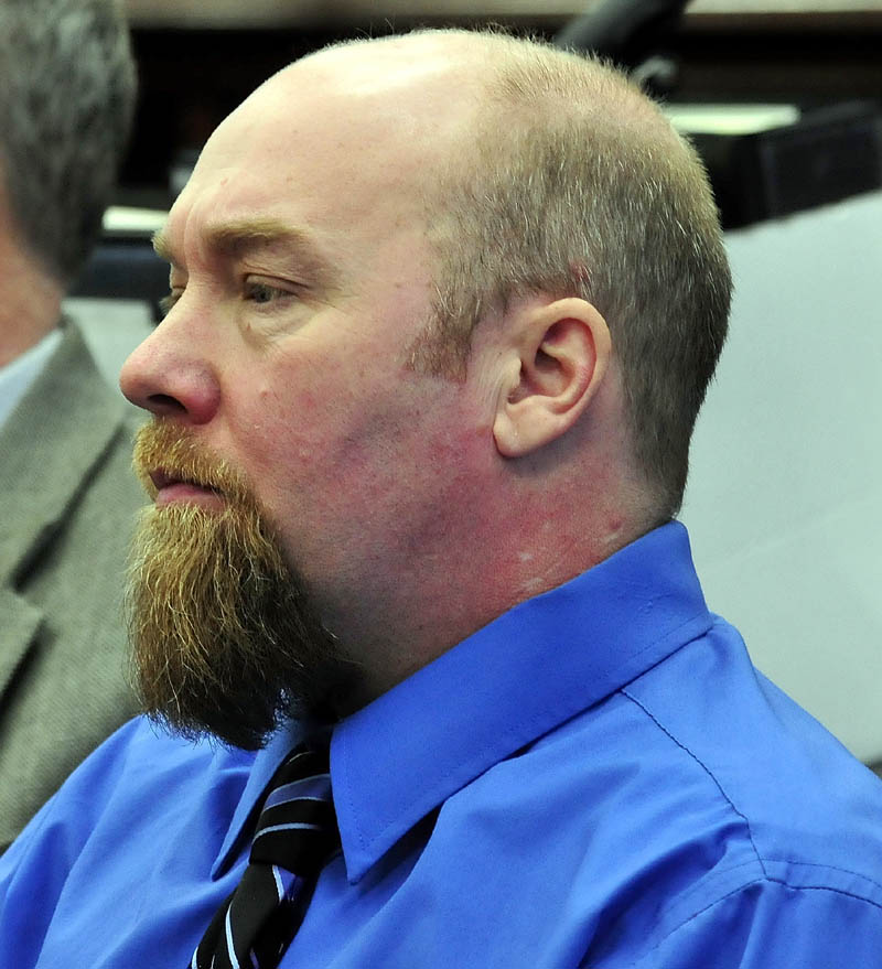 Murder defendent Robert Nelson listens to closing arguments in his trial in the death of Everett Cameron, on Tuesday in Somerset County Superior Court in Skowhegan.