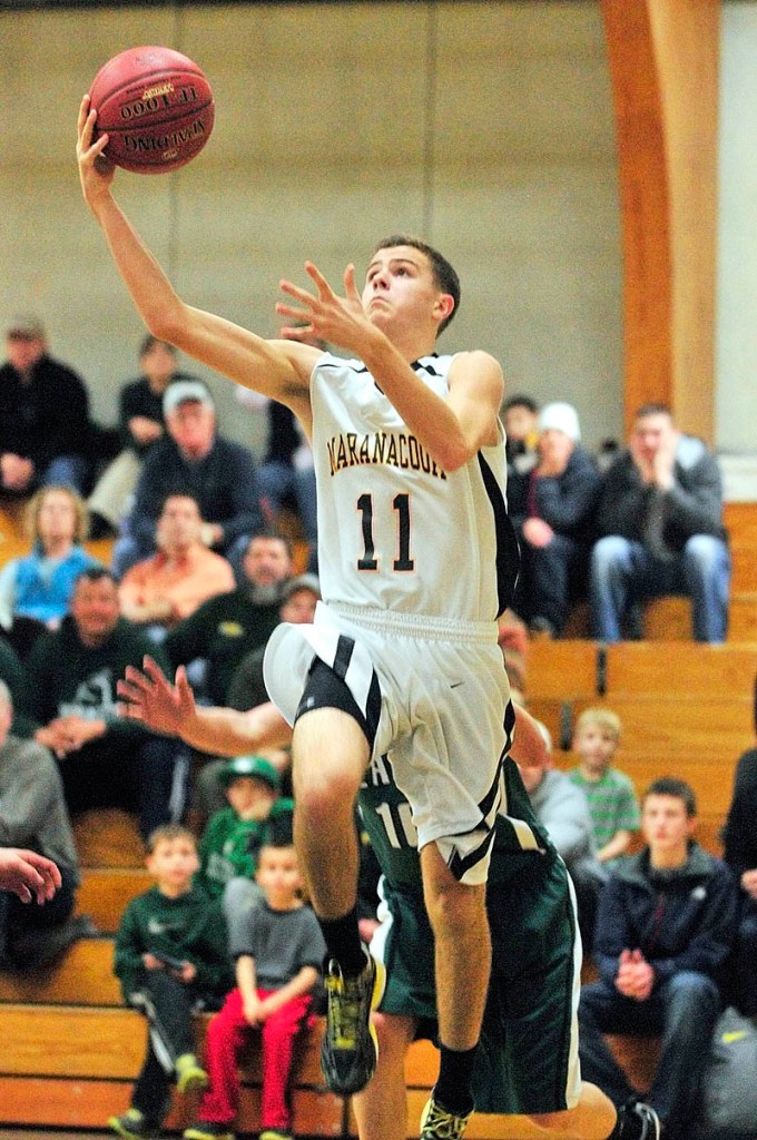 TO THE HOLE: Maranacook’s Taylor Wilbur goes up for a shot during a game against Leavitt on Tuesday in Readfield.