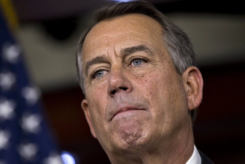 Speaker of the House John Boehner, R-Ohio, speaks to reporters about the fiscal cliff negotiations at the Capitol in Washington, Friday, Dec. 21, 2012. Five deays from the U.S. going over the 'fiscal cliff,' there's no deal in sight. (AP Photo/J. Scott Applewhite)