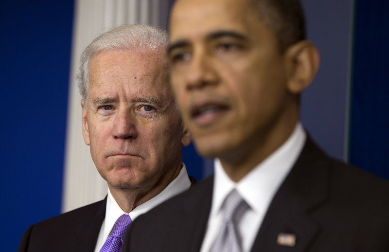 Vice President Joe Biden listens Dec. 19 as President Obama announces that Biden will lead an administration-wide effort to curb gun violence in response to the Connecticut school shooting that killed 20 children and six adults. The president supports a ban on assault weapons.