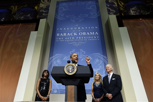 President Barack Obama and first lady Michelle Obama, Vice President Joe Biden and Jill Biden, speak to supporters and donors at an inaugural reception for the 57th Presidential Inauguration at The National Building Museum in Washington, Sunday, Jan. 20, 2013. (AP Photo/Charles Dharapak)