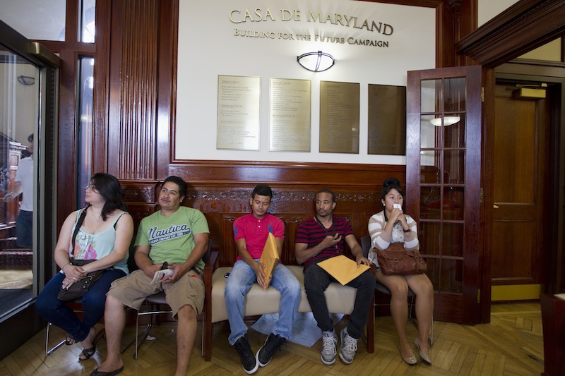 This Aug. 15, 2012 file photo shows applicants waiting in Casa de Maryland in Langley Park, Md., before they can apply for the Deferred Action Childhood Arrivals, as the U.S. started accepting applications to allow them to avoid deportation and get a work permit _ but not a path to citizenship. More than 6 in 10 Americans now favor allowing illegal immigrants to eventually become U.S. citizens, a major increase in support driven by a turnaround in Republicans' opinion after the 2012 elections. The finding, in a new Associated Press-GfK poll, comes as Republicans seek to increase their meager support among Latino voters, who turned out in large numbers to help-re-elect President Barack Obama in November. (AP Photo/Jose Luis Magana, File)