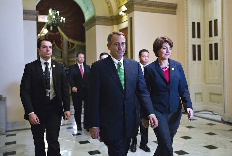 Speaker of the House John Boehner, R-Ohio, and Rep. Cathy McMorris Rodgers, R-Wash., right, the Republican Conference Chair, arrive at the House of Representatives for the final vote on emergency legislation to avoid a national "fiscal cliff" at the Capitol in Washington, Tuesday, Jan. 1, 2013. (AP Photo/J. Scott Applewhite)
