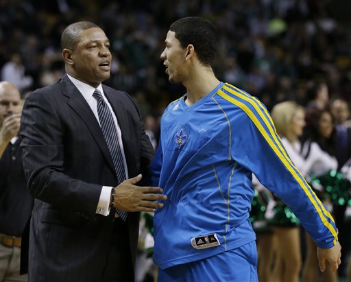 Boston Celtics head coach Doc Rivers greets his son New Orleans Hornets shooting guard Austin Rivers prior to an NBA basketball game in Boston on Wednesday. The Hornets won 90-78. TD Garden