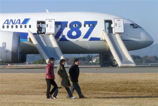 Passengers leave an All Nippon Airways Boeing 787 after it made an emergency landing at Takamatsu airport in Takamatsu, Japan, on Wednesday.