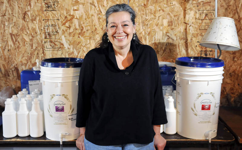 Farmingdale entrepreneur Grace Montablo is manufacturing her Gracefully Clean natural household cleaning products in the basement of her home Monday. Select Hannaford stores in Maine are stocking the products.