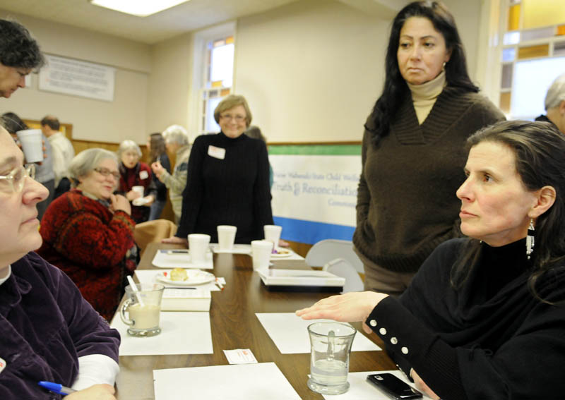 Esther Attean, right, speaks with guests at a Martin Luther King Jr. Day breakfast Monday, at the Winthrop Congregational Church, about the Maine Wabanaki-State Child Welfare Truth and Reconciliation Commission. Attean and fellow Passamaquoddy tribal member Denise Altvater, second from right, described the trauma of Native American children being placed in foster care at higher rates than white children.