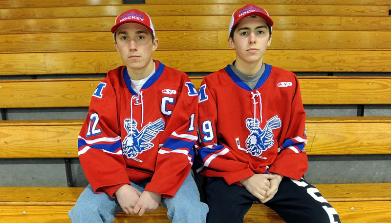 BROTHER ACT: Brothers Chase, left, and Jared Cunningham form a potent duo for the Messalonskee boys hockey team. In 10 games, the brothers have combined to score 36 goals and dish out 44 assists.