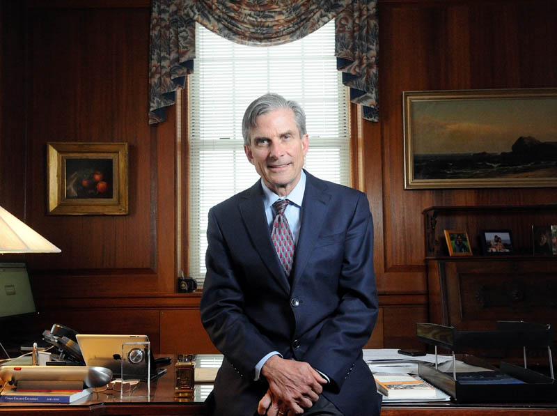 Staff photo by Michael G. Seamans William D. Adams, president of Colby College, poses for a portrait in his office Wednesday.