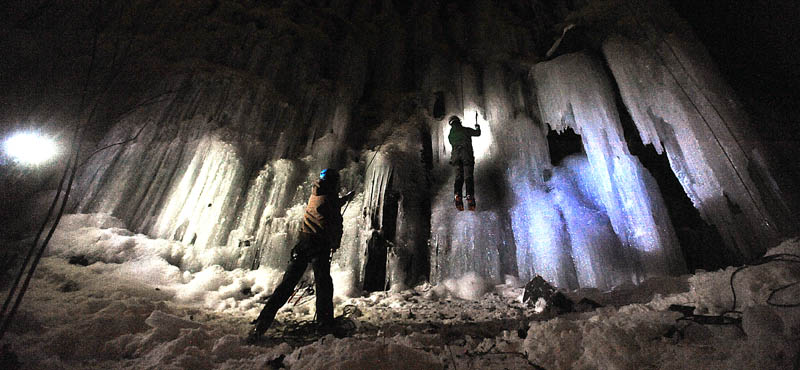 Climbers with the Colby College outing club practice their ice climbing skills at the Devil's Chair at Quarry Road Recreational Area Wednesday night.