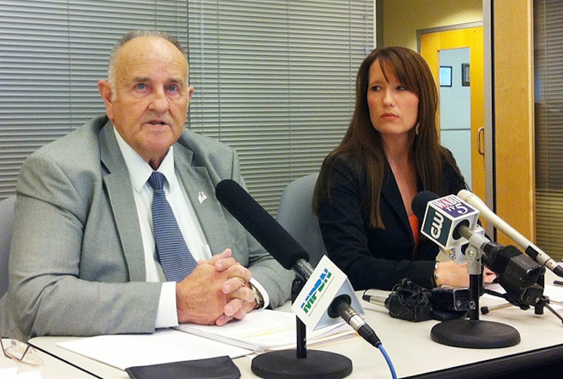 Sawin Millett Jr., the commissioner of the Maine Department of Administrative and Financial Services, and Adrienne Bennett, Paul LePage's spokeswoman, at a press conference Monday, Dec. 3, 2012. Last year, Millett earned a $101,215 salary as part of the LePage administration while also collecting $24,951 in pension benefits, according to Public Employee Retirement System data.