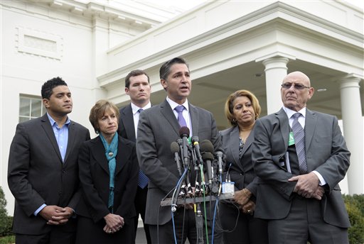 Dan Gross, president of the Brady Campaign to Prevent Gun Violence, center, speaks outside the White House in Washington on Wednesday following a meeting with Vice President Joe Biden, victims' groups and gun safety organizations.