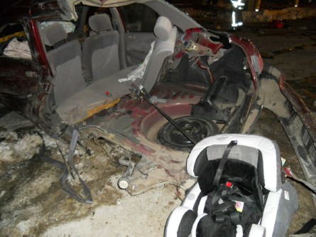 The 1999 Toyota Corolla being driven by Chynna Blaney was destroyed in a collision with a large pickup Thursday evening, and the impact ripped off the rear quarter of the car, dislodging the infant seat that Blaney's 6-month-old was using.