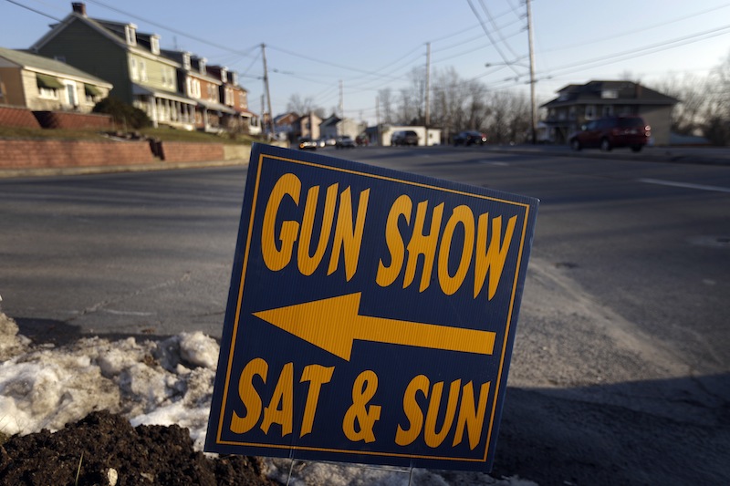 A sign is posted for an upcoming gun show, Friday, Jan. 4, 2013, in Leesport, Pa. Gun advocates aren't backing down from their insistence on the right to keep and bear arms. But heightened sensitivities and raw nerves since the Newtown, Conn. shooting are softening displays at gun shows and even leading officials and sponsors to cancel the popular exhibitions altogether. (AP Photo/Matt Rourke)