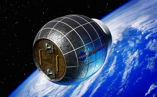 This artist's rendering provided by Bigelow Aerospace shows an inflatable space station. NASA is partnering with this commercial space company to test an inflatable room that can be compressed into a 7-foot tube for delivery to the International Space Station. NASA is expected to install the module by 2015.