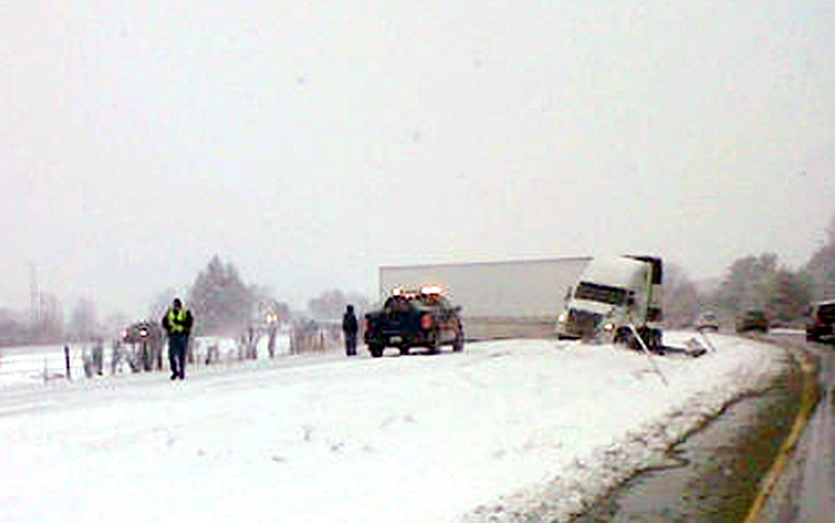 Maine State Police photo of tractor-trailer blocking southbound lanes of I-295 in Yarmouth.