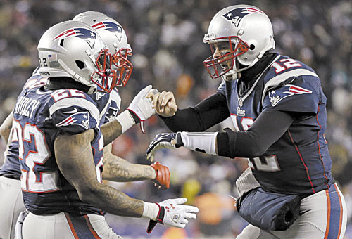READY TO GO: Quarterback Tom Brady (12) and running back Stevan Ridley (22) will lead the New England Patriot offense against the Houston Texans in the AFC division playoffs Sunday in Foxborough, Mass. The Patriots beat the Texans 42-14 earlier this season.