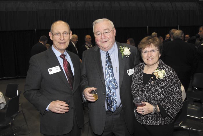 From left, Peter Vigue with Kennebec Valley Chamber of Commerce Lifetime Achievement Award recipient Peter Prescott, of Everett J. Prescott, Inc. and wife, Sandra, at the Kennebec Valley Chamber of Commerce's annual awards banquet at the Augusta Civic Center on Friday night.