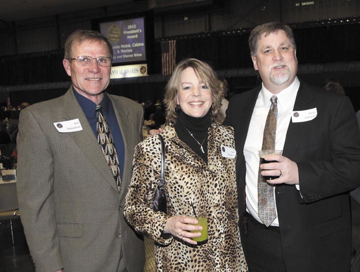 From left, representing Kozak and Gayer are Bill and Jane Dennison, and Steven Johnson, at the Kennebec Valley Chamber of Commerce's annual awards banquet at the Augusta Civic Center on Friday night.